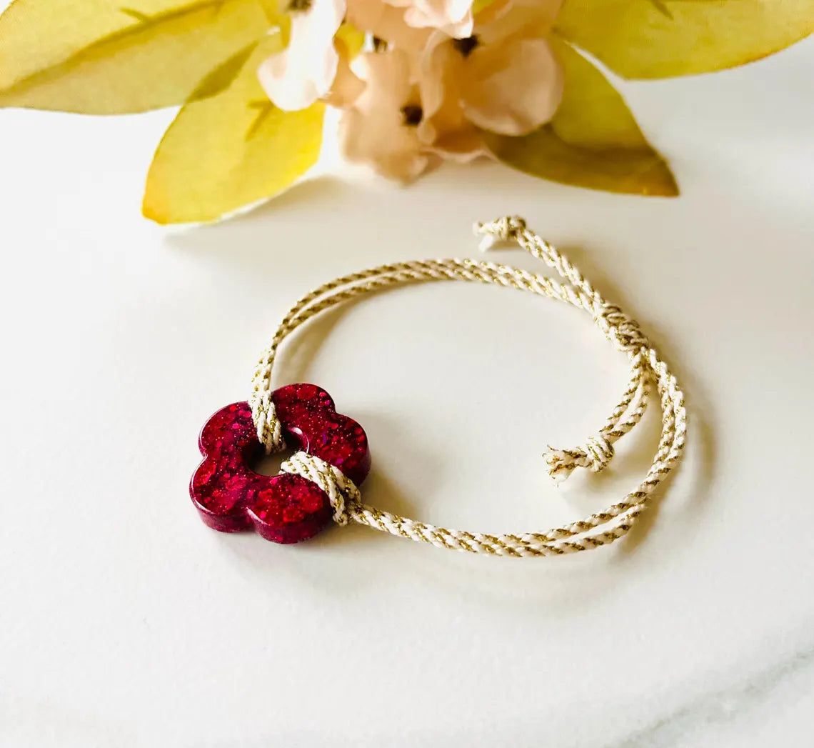 Cotton cord bracelet with glittery flower